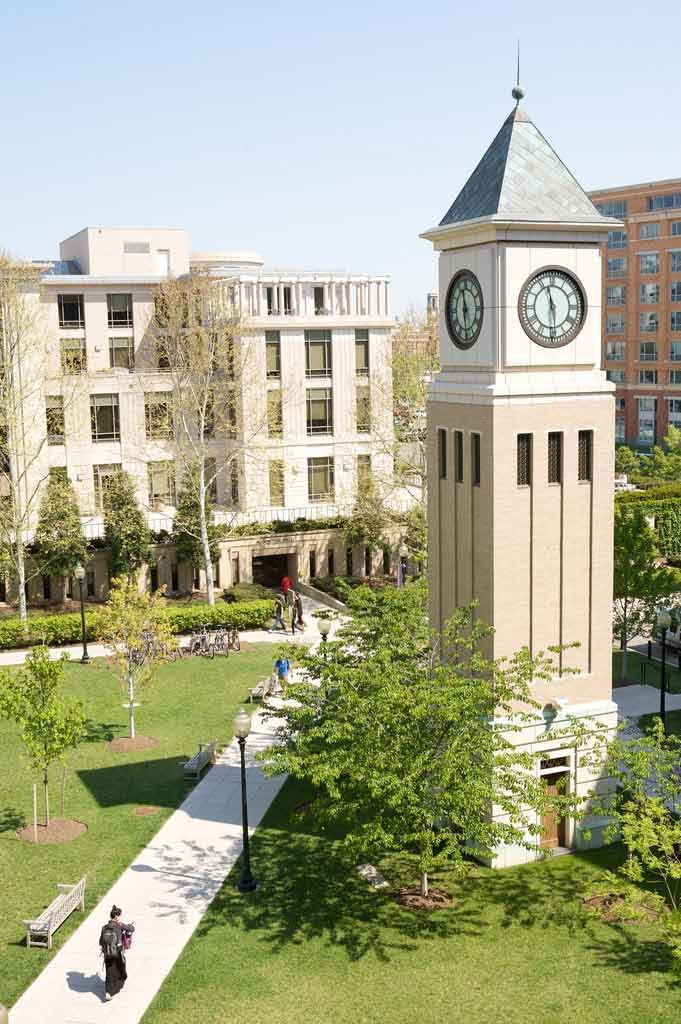 Clocktower rises over the quad at the Georgetown University Law Center